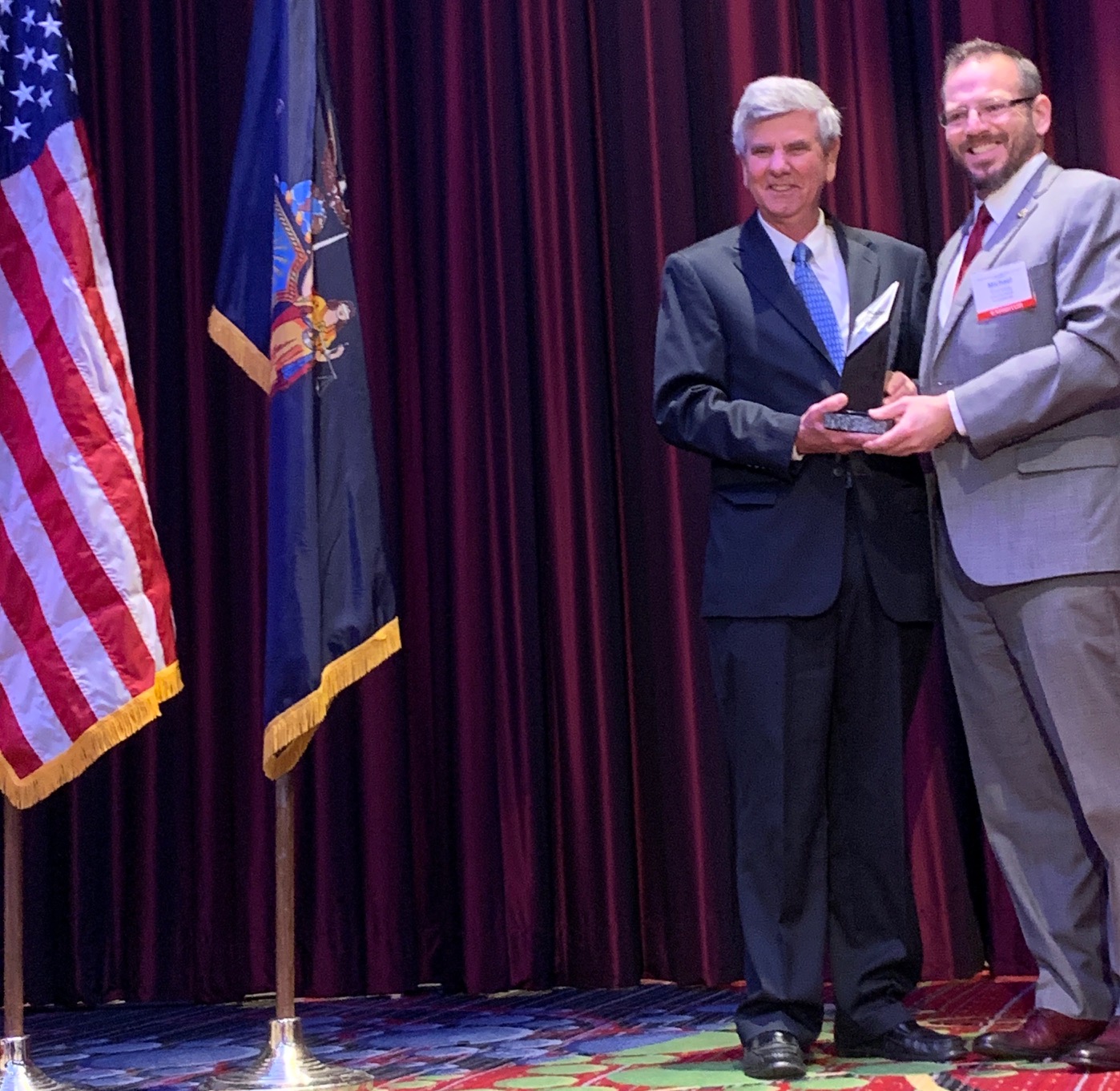 Michael Kenneally, Comp Alliance Executive Director, presents the Town of Cornwall Supervisor, Dick Randazzo with the G. Jeffrey Haber Leadership Award